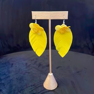 Brand new bright yellow flower and feather-like earrings